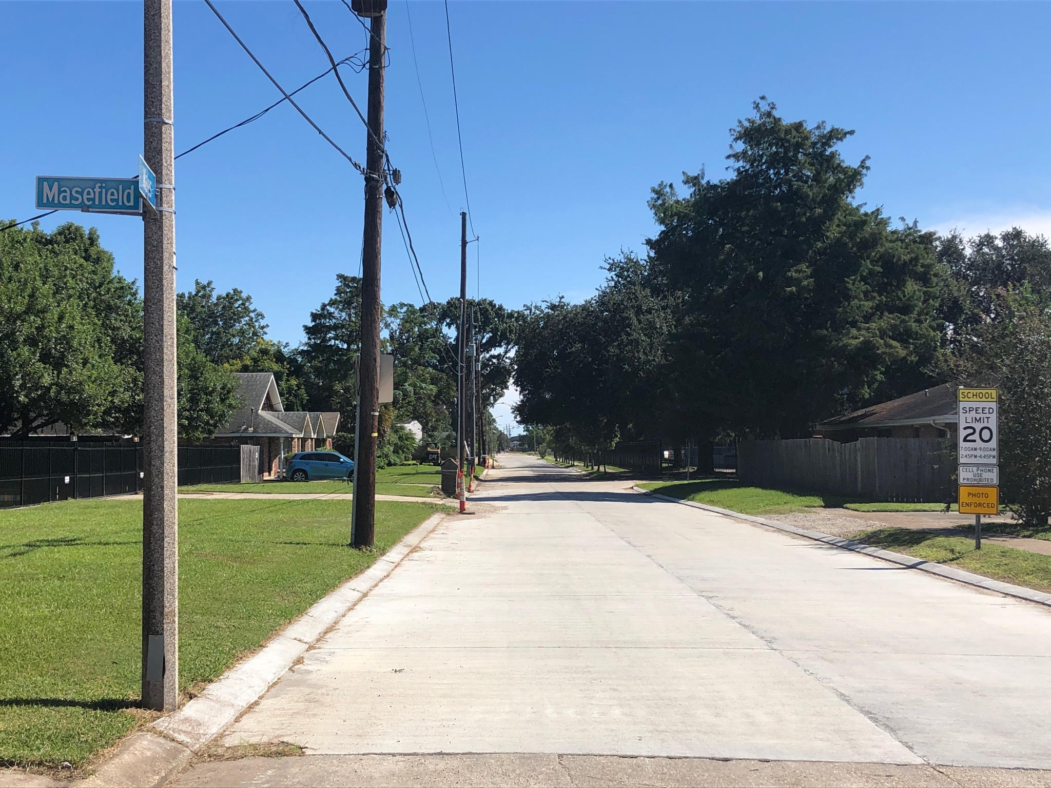 CREWS CONTINUE REPAVING OPEN AREAS ON THE LITTLE WOODS GROUP A PROJECT
